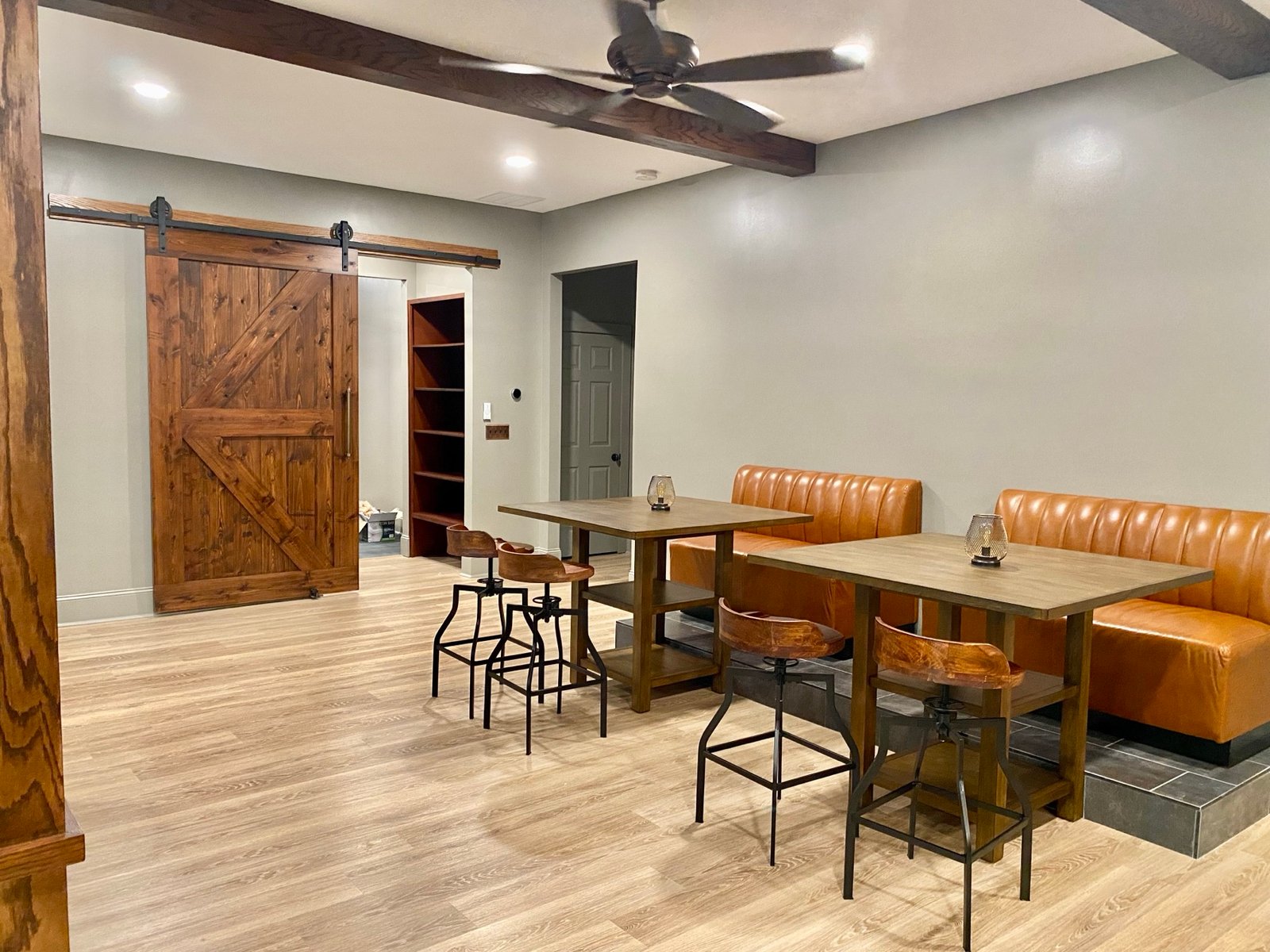 Finished basement dining nook with barn door in Dawsonville, GA