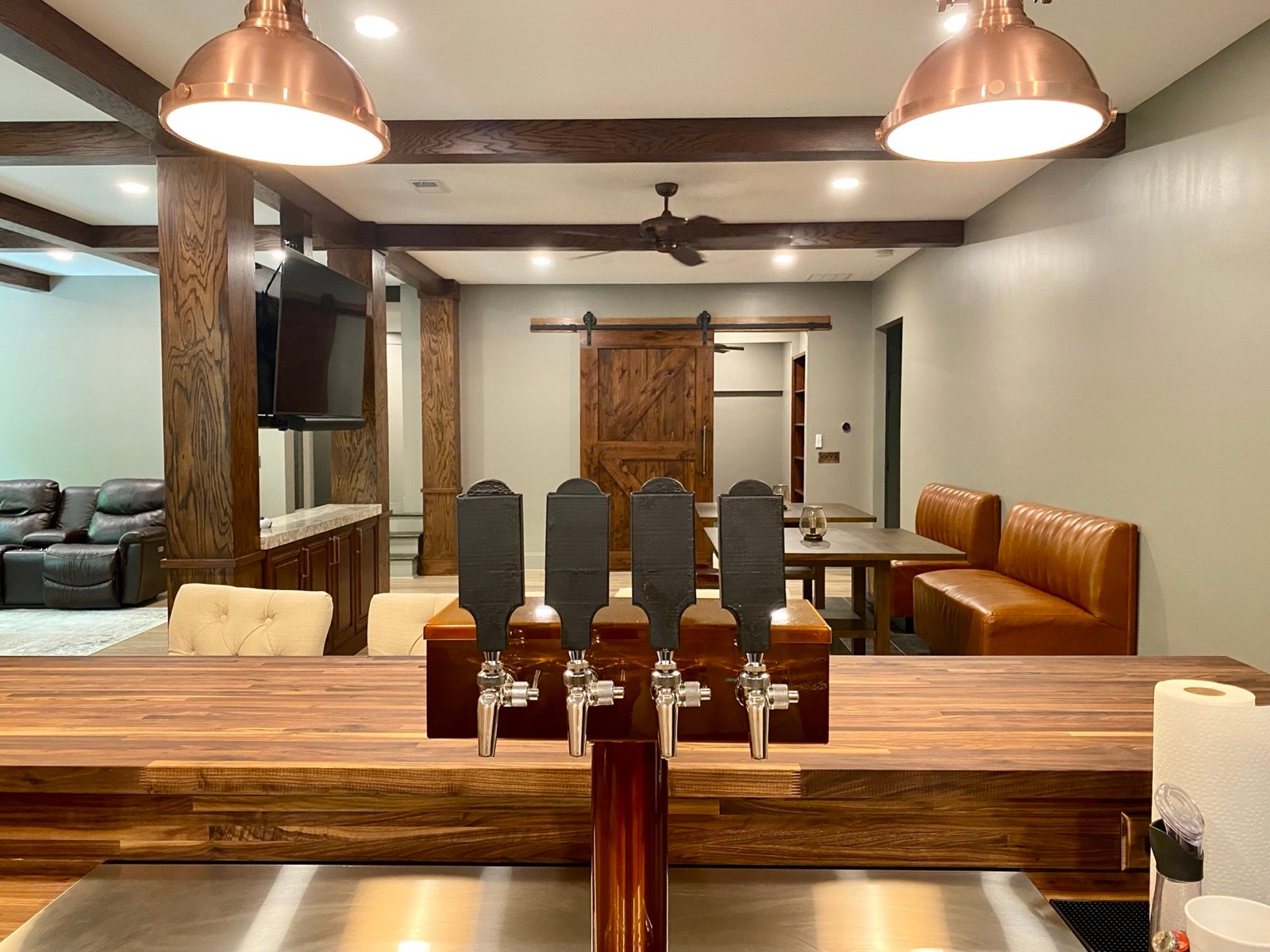 Finished basement bar and entertainment addition by GHIR Construction in Dawsonville, GA