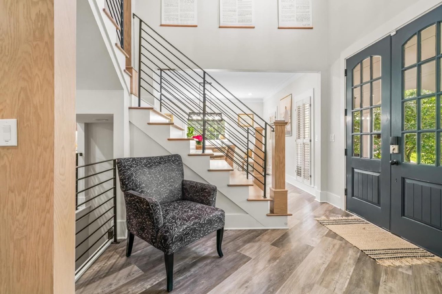 Custom staircase and entry in a GHIR Construction home in North Georgia
